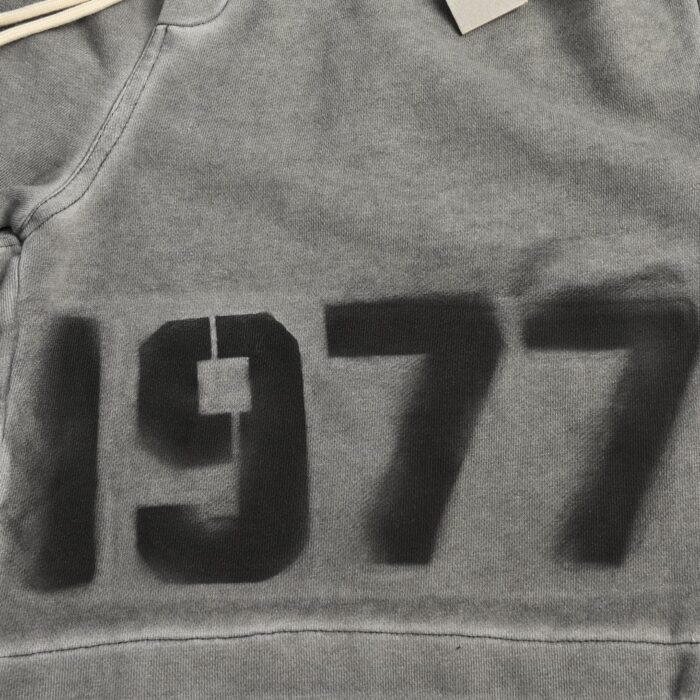 Essentials 1977 Logo Zipper Short crossreps