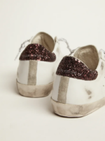 Super-Star sneakers with brown glitter heel tab and pink crackled leather star crossreps