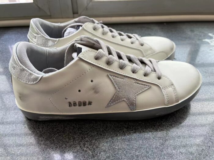 Super-Star sneakers with silver sparkle foxing and metal stud lettering crossreps