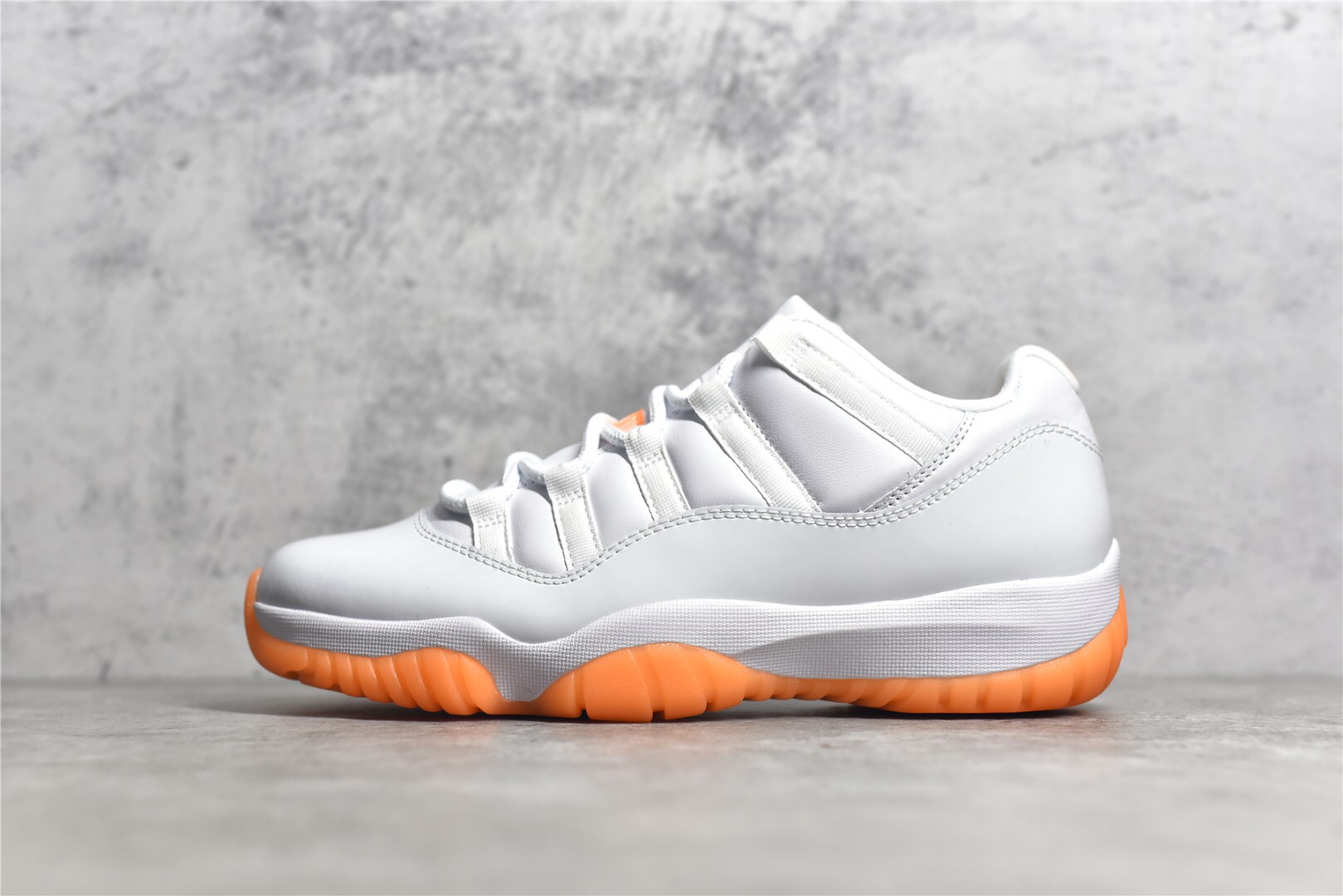 Jordan 11 Retro Low “Bright citrus”