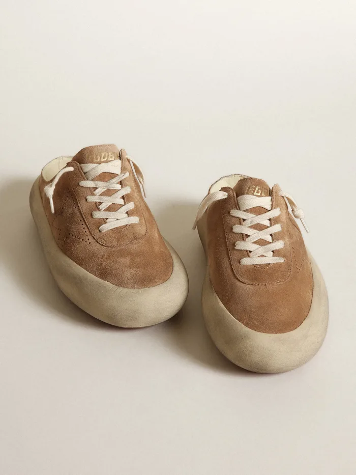 Space-Star Sabots in tobacco-colored suede with perforated star