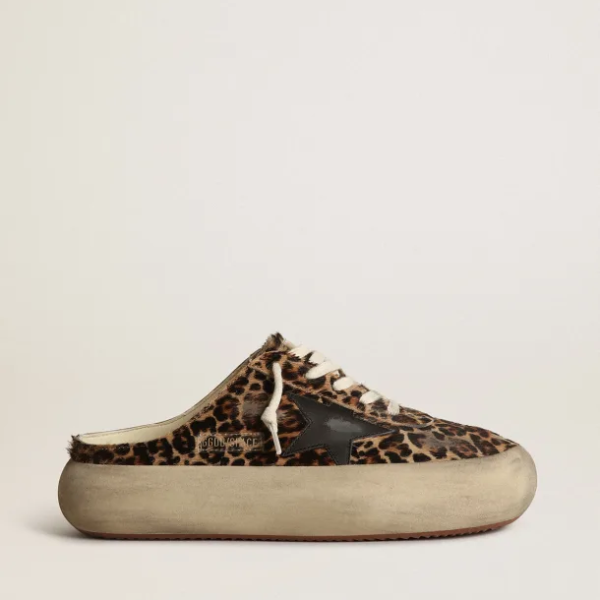 Space-Star Sabots in leopard-print pony skin with black leather star