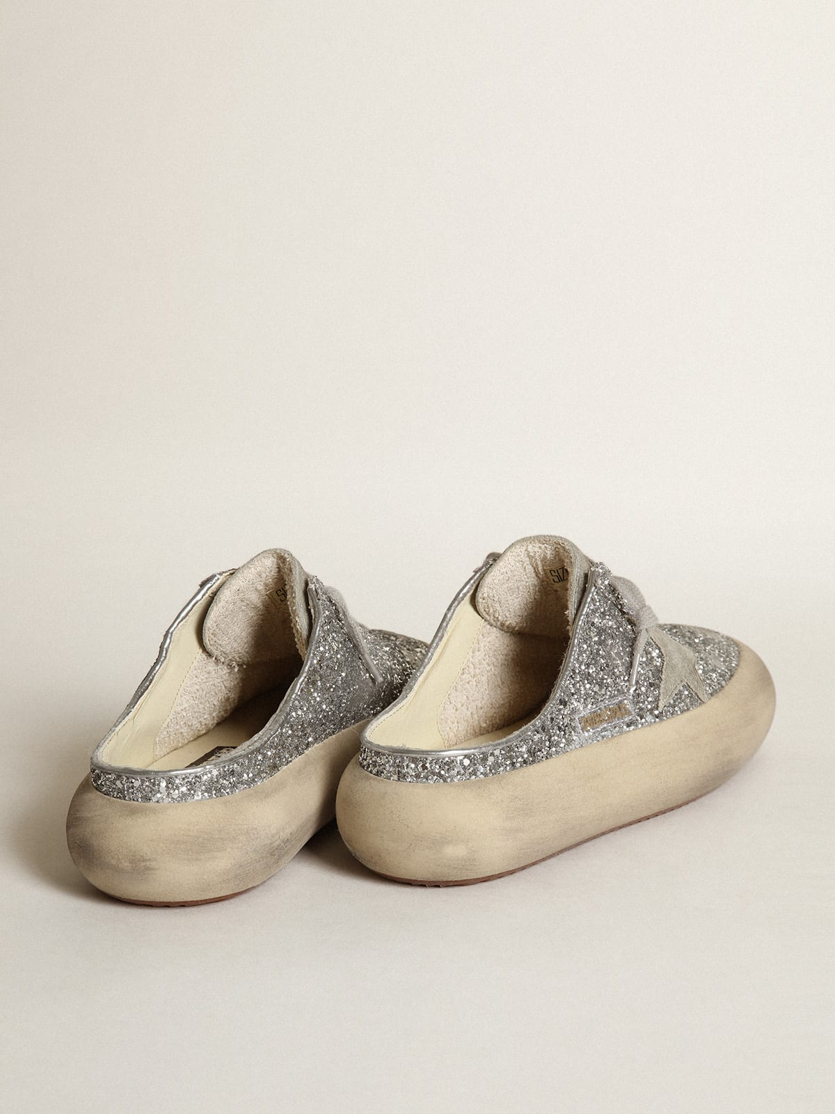 Space-Star Sabots in silver glitter with ice-gray suede star and tongue