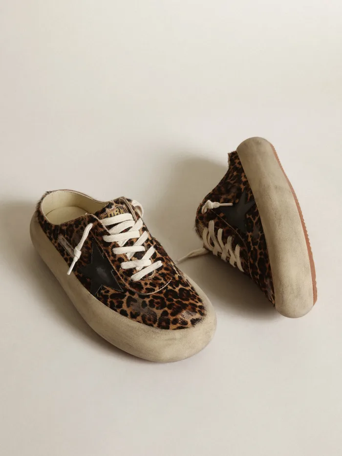 Space-Star Sabots in leopard-print pony skin with black leather star