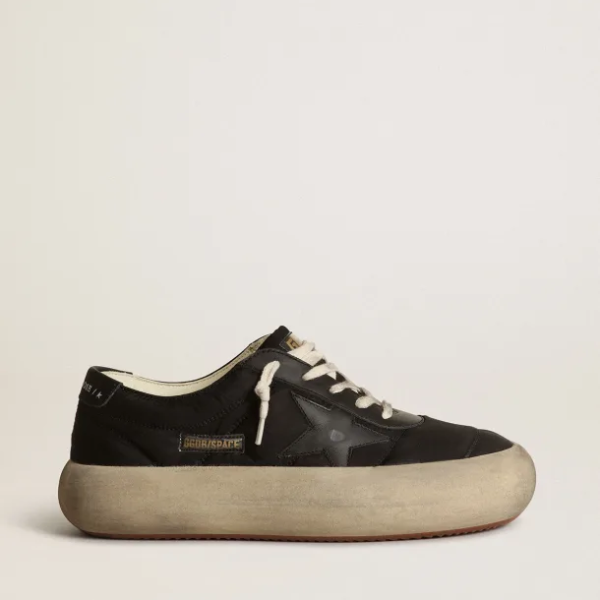 Space-Star shoes in black nylon with black leather star and heel tab