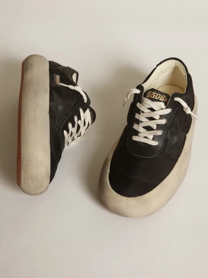 Space-Star shoes in black nylon with black leather star and heel tab