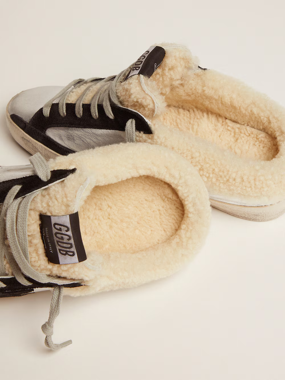 Super-Star Sabot in silver laminated leather with black star