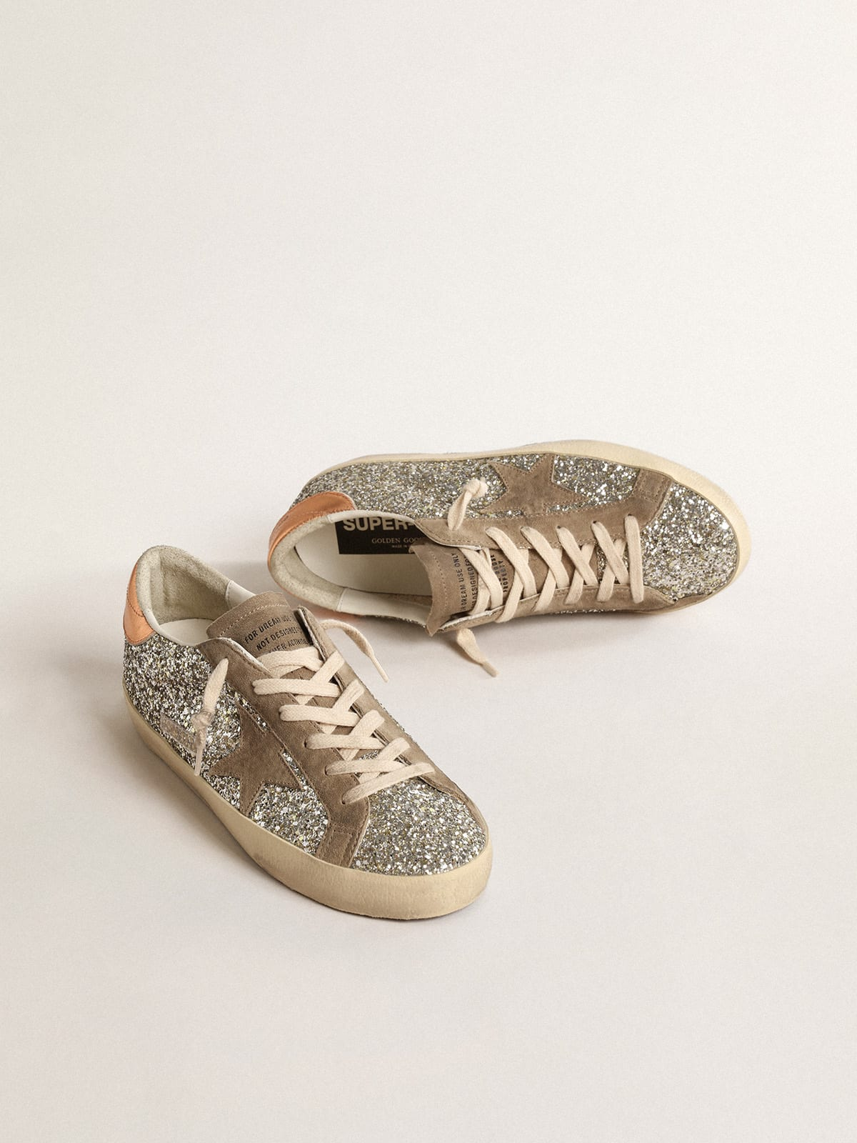 Super-Star in platinum glitter with dove-gray suede star