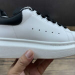 Alexander McQueen Oversized Sneaker – White & Metallic Rose Gold Heel