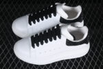 Alexander McQueen Oversized Sneaker – White Leather with Black Crystal Heel Tab
