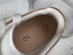 Alexander McQueen Oversized Sneaker – White Leather with Black Suede Heel Tab & Transparent Sole