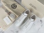 Alexander McQueen Oversized Sneaker – White Leather with Black Suede Heel Tab & Transparent Sole
