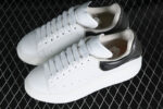 Alexander McQueen Oversized Sneaker – White Leather with Glossy Black Heel Tab