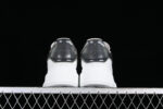 Alexander McQueen Oversized Sneaker – White Leather with Glossy Black Heel Tab