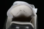 Alexander McQueen Oversized Sneaker – White Leather with Glossy Black Heel Tab