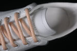 Alexander McQueen Oversized Sneaker – White Leather with Metallic Silver Heel Tab