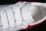 Alexander McQueen Oversized Sneaker – White Leather with Red Suede Heel Tab
