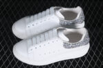 Alexander McQueen Oversized Sneaker – White Leather with Silver Glitter Heel Tab