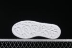 Alexander McQueen Oversized Sneaker – White Leather with Silver Glitter Heel Tab