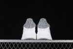 Alexander McQueen Oversized Sneaker – White Leather with Silver Glitter Heel Tab