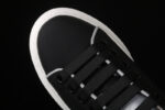 Alexander McQueen Oversized Sneakers – Black with White Contrast Heel