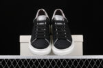 Alexander McQueen Oversized Sneakers – Black with White Contrast Heel