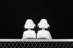 Alexander McQueen Oversized Sneakers – Black with White Contrast Heel