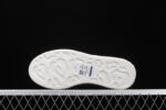 Alexander McQueen Oversized Sneakers – White with Black & Grey Abstract Print
