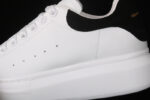 Alexander McQueen Oversized Sneakers – White with Black Suede Heel Tab