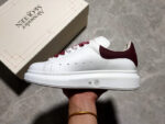 Alexander McQueen Oversized Sneakers – White with Orange Suede Heel