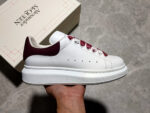 Alexander McQueen Oversized Sneakers – White with Orange Suede Heel