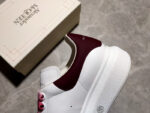 Alexander McQueen Oversized Sneakers – White with Orange Suede Heel