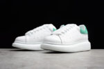 Alexander McQueen Oversized Sneakers – White with Green Suede Heel