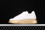 Alexander McQueen Oversized Sneakers – White with Metallic Gold Sole