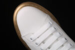 Alexander McQueen Oversized Sneakers – White with Metallic Gold Sole