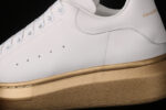 Alexander McQueen Oversized Sneakers – White with Metallic Gold Sole