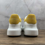 Alexander McQueen Oversized Sneakers – White with Mustard Heel Tab