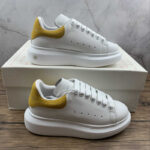 Alexander McQueen Oversized Sneakers – White with Mustard Heel Tab