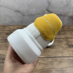 Alexander McQueen Oversized Sneakers – White with Mustard Heel Tab