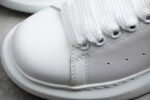 Alexander McQueen Oversized Sneakers – White with Red Suede Heel