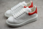 Alexander McQueen Oversized Sneakers – White with Red Suede Heel