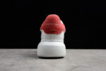 Alexander McQueen Oversized Sneakers – White with Red Suede Heel