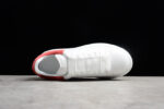 Alexander McQueen Oversized Sneakers – White with Red Suede Heel