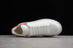 Alexander McQueen Oversized Sneakers – White with Red Suede Heel