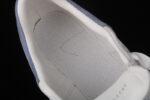 Alexander McQueen Oversized Sneakers – White with Sky Blue Heel Tab