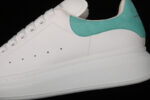 Alexander McQueen Oversized Sneakers – White with Teal Heel Tab