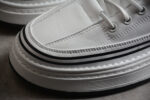 Dior Low-Top Platform Sneaker – White Leather with Black Accents