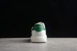 Dior Low-Top Sneaker with Green Panel & Embroidered Logo